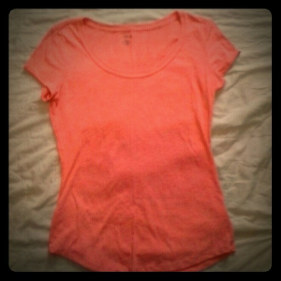 A peach scoop neck shirt