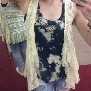 Cream colored A'Reve vest with ruffles!
