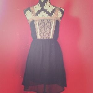 Black, lace dress, with lace straps.