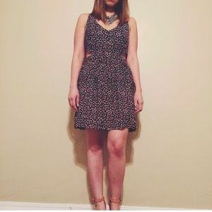 Polka dot dress with cut out sides