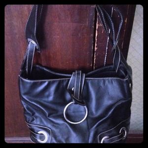 Trendy black purse with circular buckles