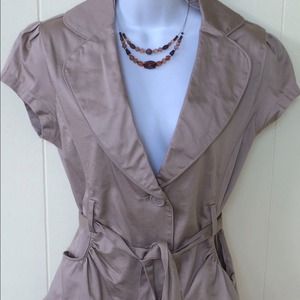 Short sleeve peplum jacket.