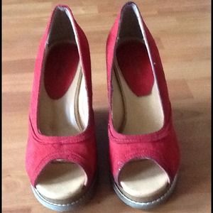 Red wedge heels.