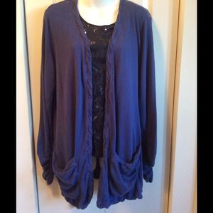 Open cardigan with cute details.