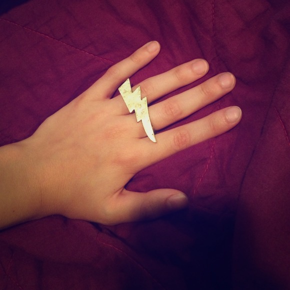 Gold colored lightning bolt ring