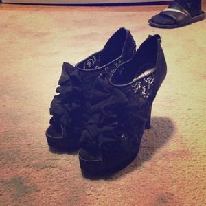 All black. Ruffles & lace. Very classy.