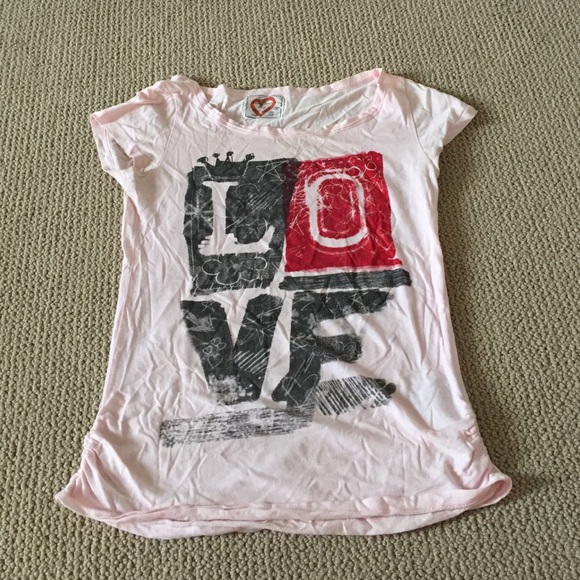 Light pink shirt that says Love