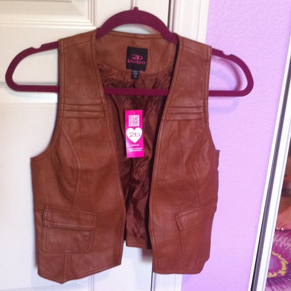 Fake brown leather vest. Never worn with price