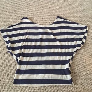 Navy and cream colored, a little open in the back