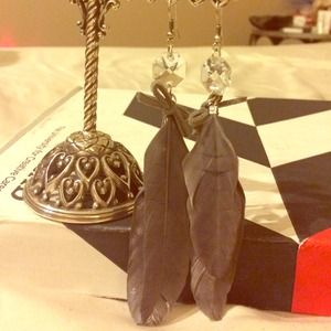 Gray feathered earrings