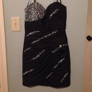 Black Faviana couture cocktail dress.