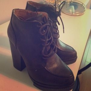 Dark brown booties. Never been worn!