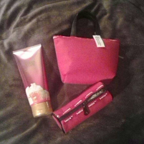VS Sheer Love lotion with red m as make-up bags