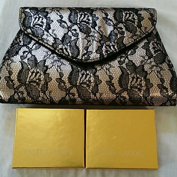 Neiman Marcus clutch and Est?e Lauder face powders