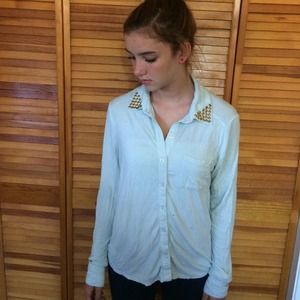 Blue shirt with studded collar and sheer back