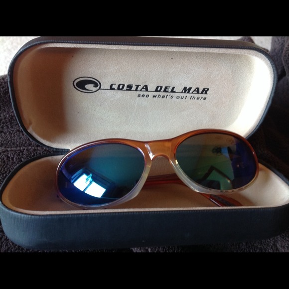 Costa Del Mar glass amber lens, mirror finish