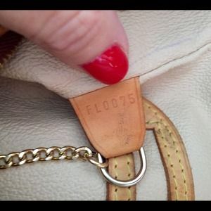 LV AUTHENTIC BUCKET BAG (same listing- more pics)-