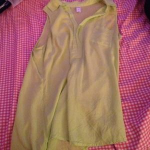 like green sleeveless blouse