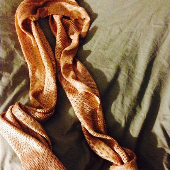 Pink shimmery scarf.