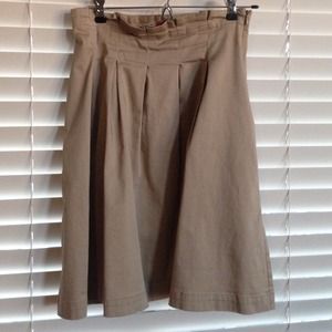 Tan above the knee pleated skirt