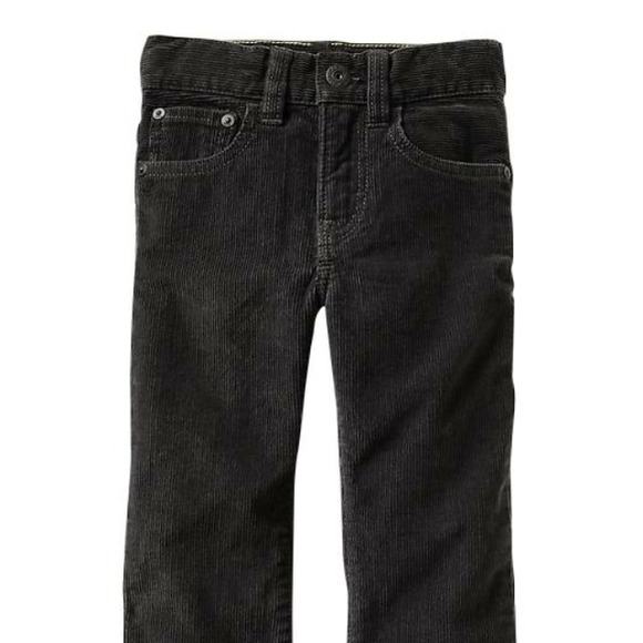 3 pairs of pants and orange lace shoes