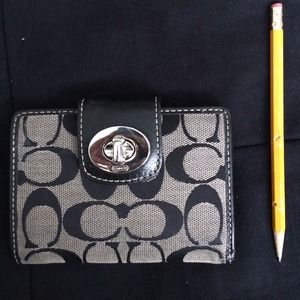 Barely used coach monogrammed wallet
