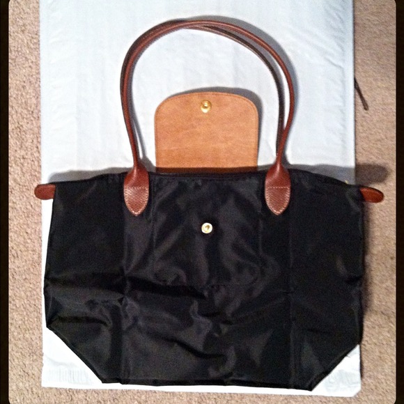 how to fold longchamp bag