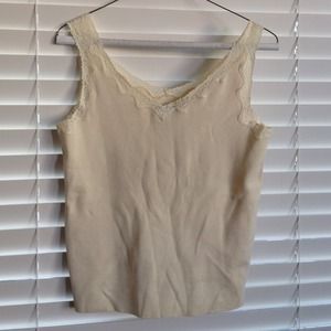 Sleeveless cream sweater