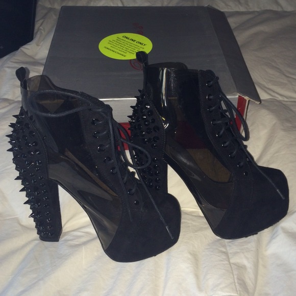 Black/clear studded platforms.
