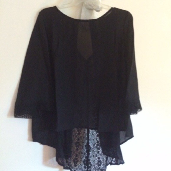 Black foley top w lace back and detailing