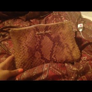 Michael Kors python exclusive shoulder bag.
