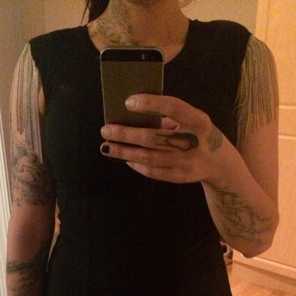 Black top with strass silver metal accents.