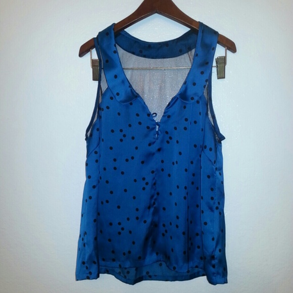Blue polka dotted tank.