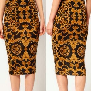 It looks like Versace print! Navy blue & mustard