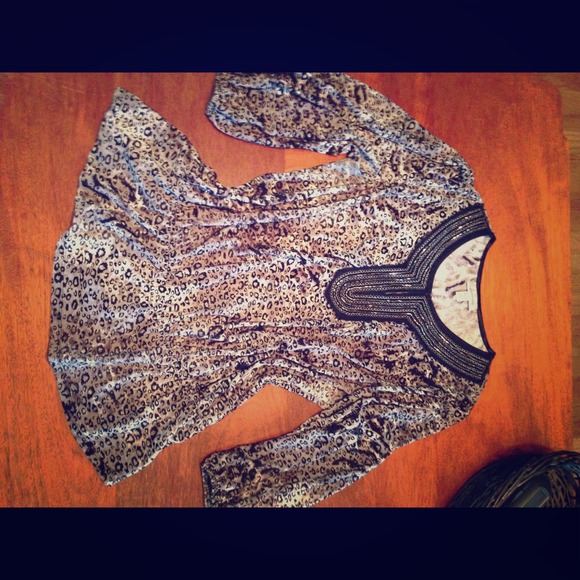 Tunic style cheetah print top
