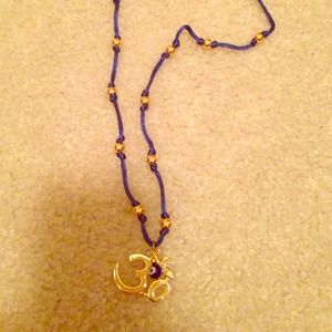 Om symbol necklace.