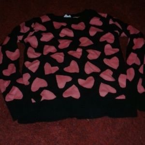A Black and Pink heart printed sweater