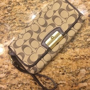 Gently used authentic Coach Wristlet.
