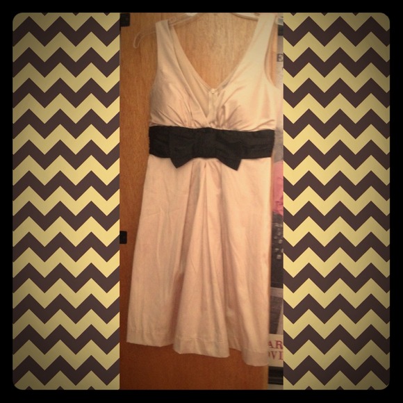 Beige and bow cocktail dress