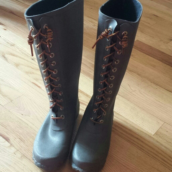 Grey laced up rain boots.
