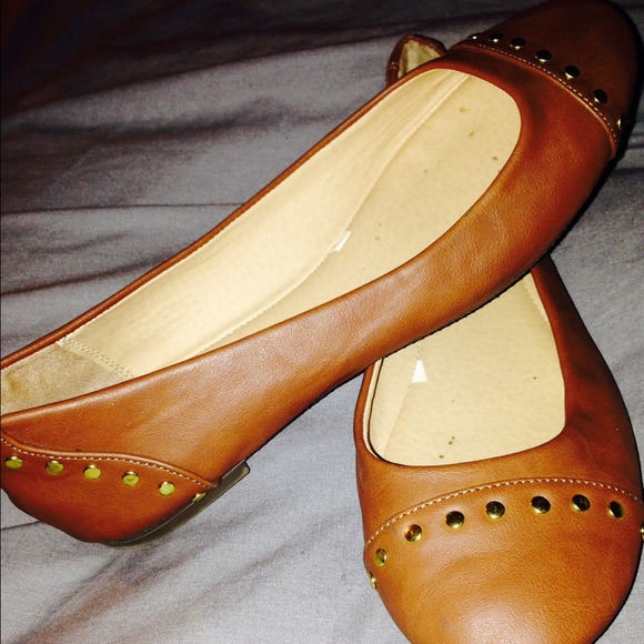 Camel colored flats with gold embellishment.