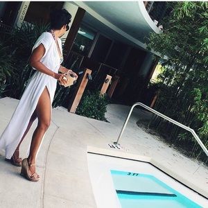 White maxi cover up with side slits.