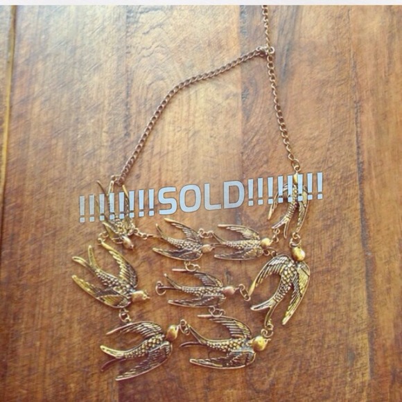 Flock of birds bronze necklace
