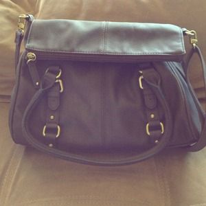 Brown fold over purse