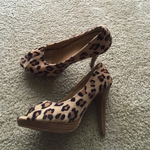 Faux leopard peep toe pumps