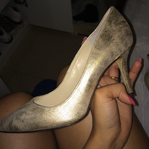 Enzo Angiolini gold heels.