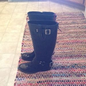 Steve Madden tall black rain boots w/ red zipper.
