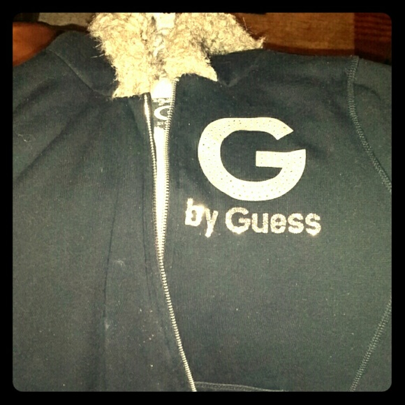 Like new Guess zip up bling and faux fur lined