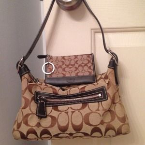Brown Coach purse and coach coin purse together