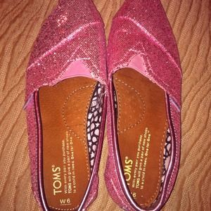 Pink glitter toms size 6.